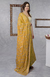 On Her: Mango Mojito Gota Patti & Zari Anarkali Set | On Him: Sunglow Yellow Pintuck Kurta & Mustard Waistcoat Jacket Set