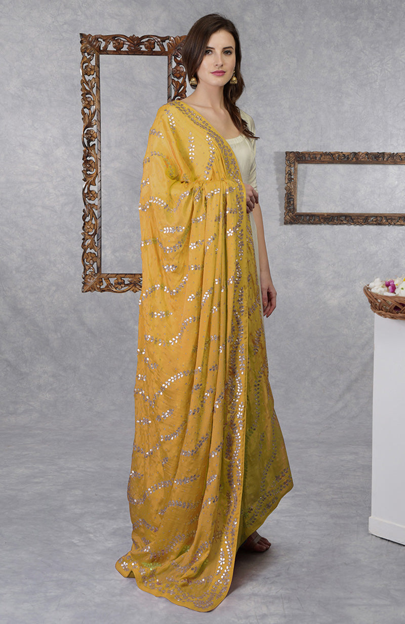 On Her: Mango Mojito Gota Patti & Zari Anarkali Set | On Him: Sunglow Yellow Pintuck Kurta & Mustard Waistcoat Jacket Set