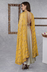 On Her: Mango Mojito Gota Patti & Zari Anarkali Set | On Him: Sunglow Yellow Pintuck Kurta & Mustard Waistcoat Jacket Set