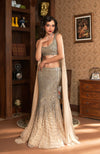 NAIRA-Champagne Gold Crystal Hand Embroidered Mermaid Lehenga with Shoulder Cape