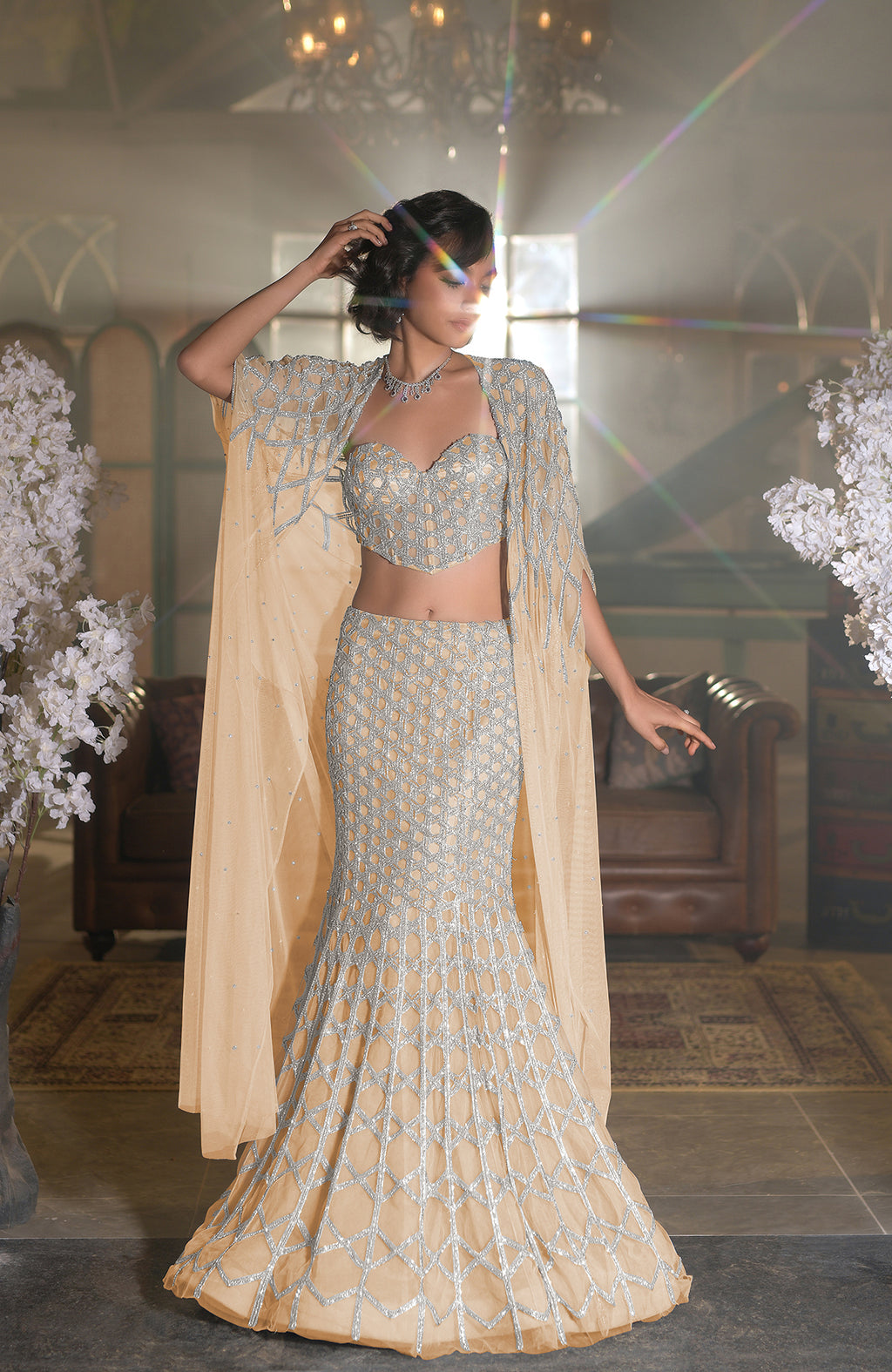 Blue crystal hand-embroidered mermaid lehenga set with cape and intricate silver hexagonal patterns