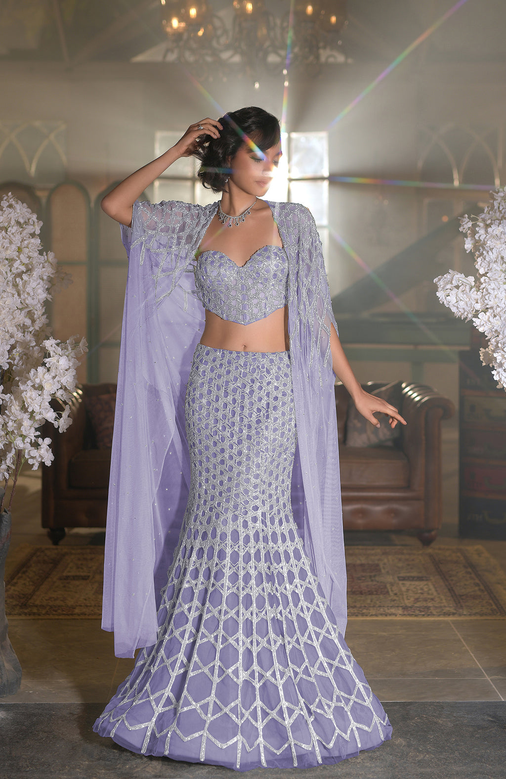 Blue crystal hand-embroidered mermaid lehenga with cape and intricate silver hexagonal beadwork