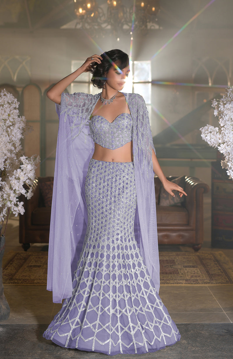 Blue crystal hand-embroidered mermaid lehenga set with cape and intricate silver hexagonal patterns