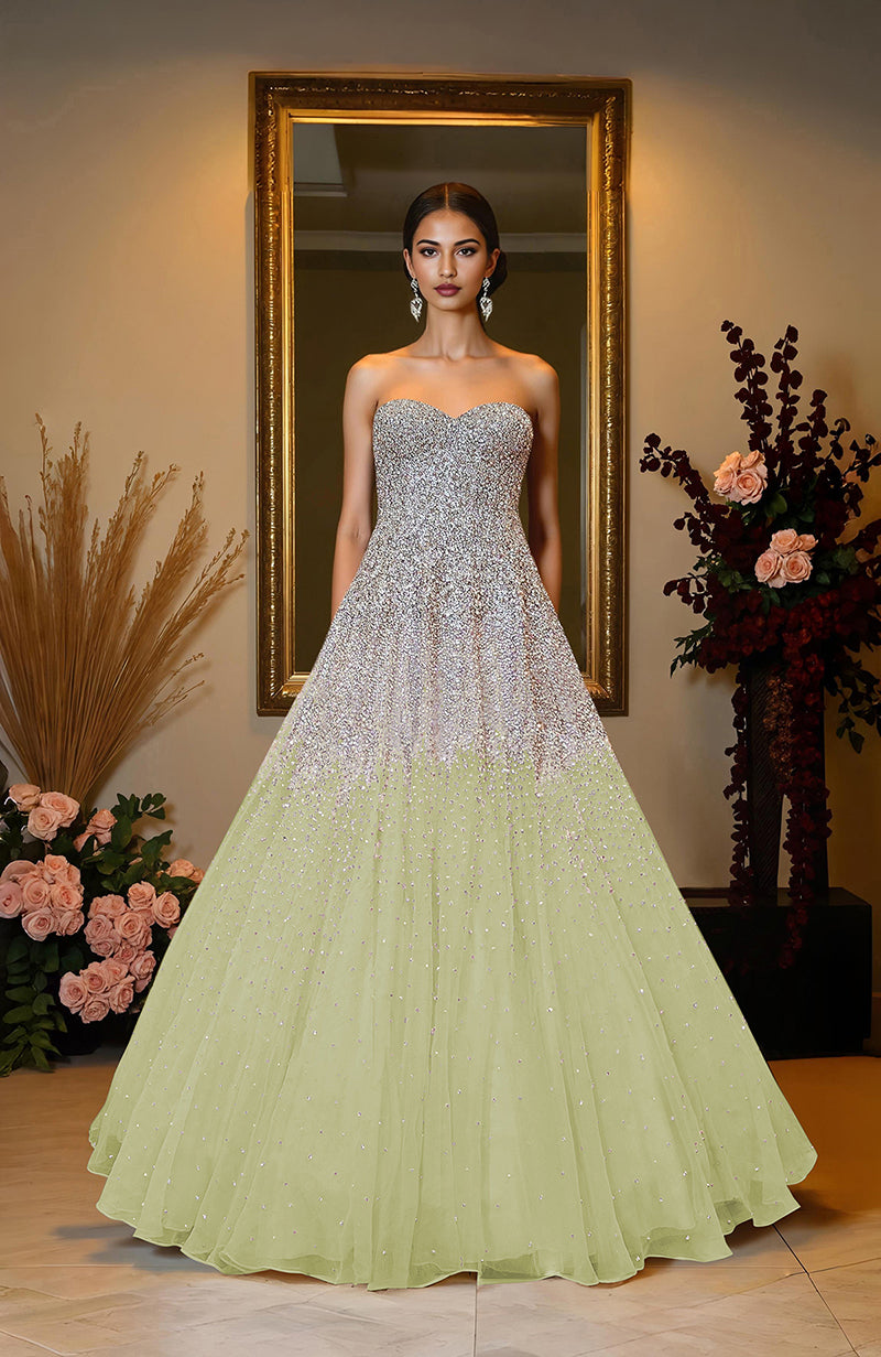 Ivory princess gown with hand-embroidered crystal and pearl beads on corset bodice and skirt.