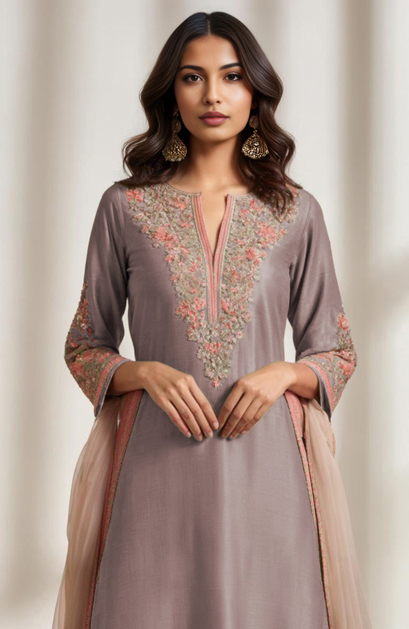 Sage green kurta set with salmon peach and gold floral embroidery and wide-leg trousers