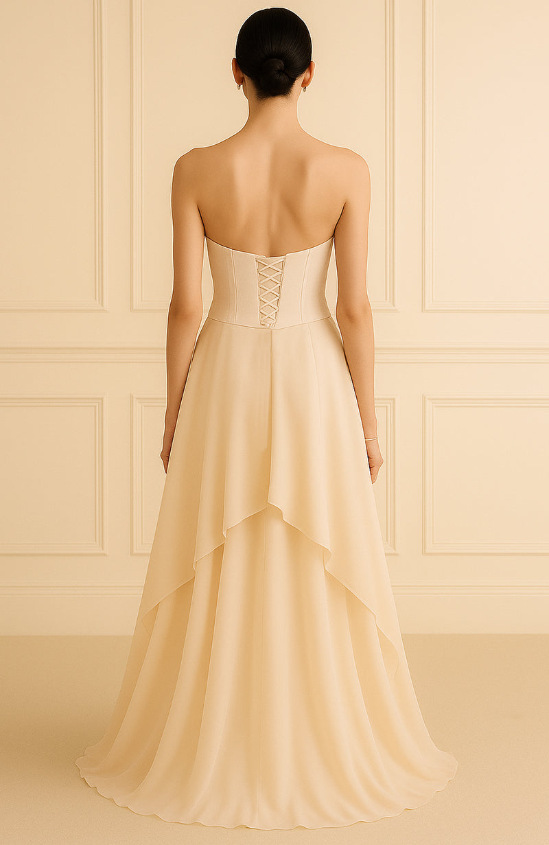 Strapless blush gown with pearl and bead embroidered corset bodice and flowing A-line skirt
