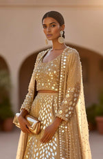 Golden Mirror Hand Embroidered Lehenga Set with Pearl Cape – SOLSTICE from the JALWA Collection by Talking Threads
