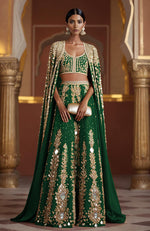 Amber lehenga with mirrorwork and sequins, paired with a full-length mirror cape and sleeveless blouse.