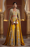 Orange lehenga with hand-embroidered mirrors, sequins, and a full-length mirror cape.