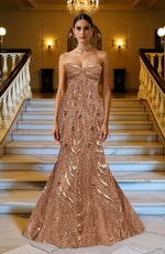 Rose gold strapless mermaid gown with intricate sequin and bead embroidery and a sweetheart neckline