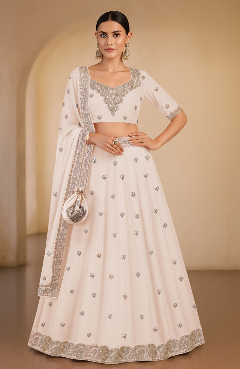Sea salt lehenga set with gota patti and zardozi embroidery, flared silhouette, and matching dupatta.