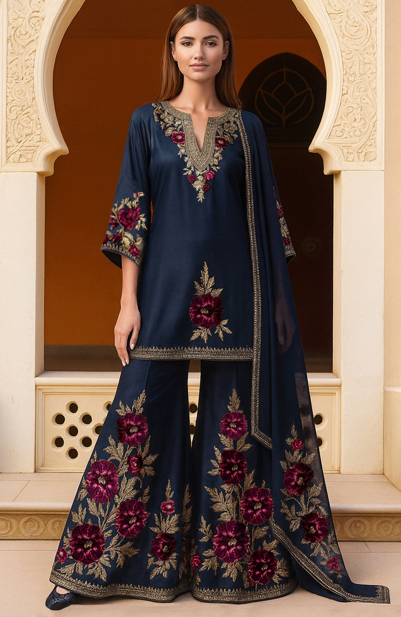 Navy blue sharara set with gold and burgundy floral embroidery and matching dupatta.
