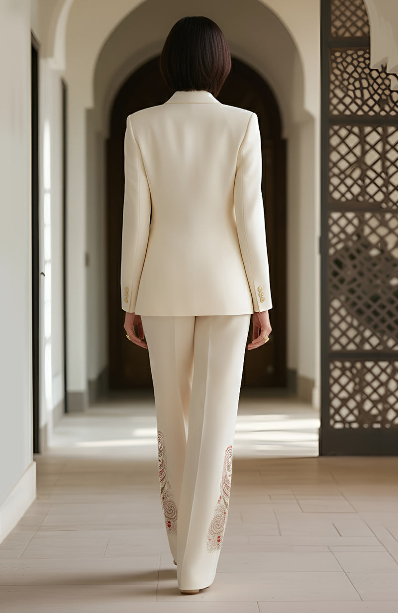 Ivory blazer with paisley embroidery and matching trousers in a tailored fit.